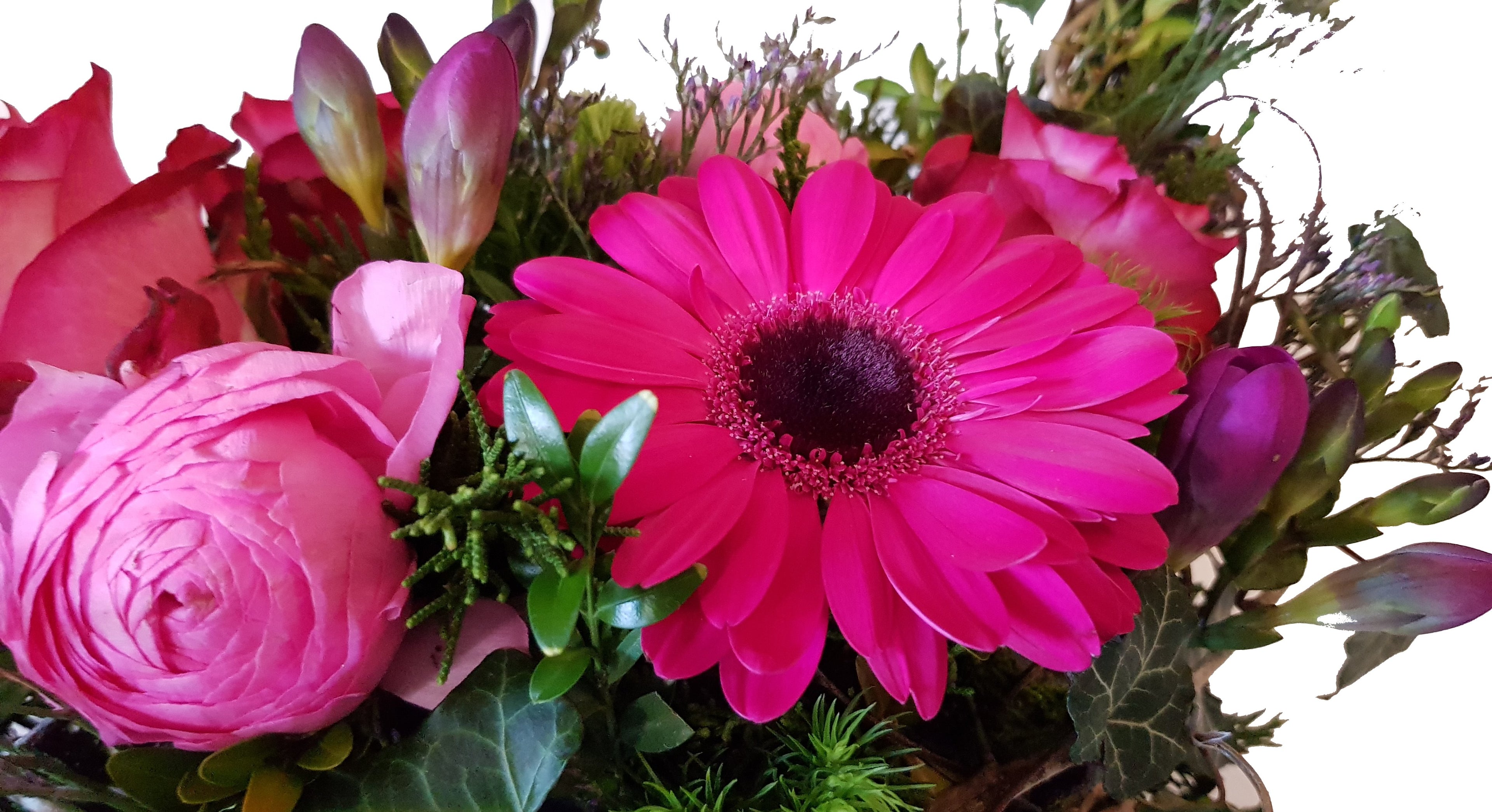 Gesteck in Pink für Bestattung mit Rosen, Gerbera und anderen Blumen