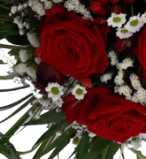 Besonderes Blumengestec zur Beerdigung - Form Traene - aus Gras Geflochten in rot weiß mit frischen Blumen gestaltet