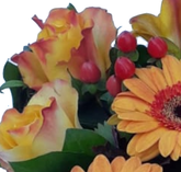 Trauergesteck in Orange